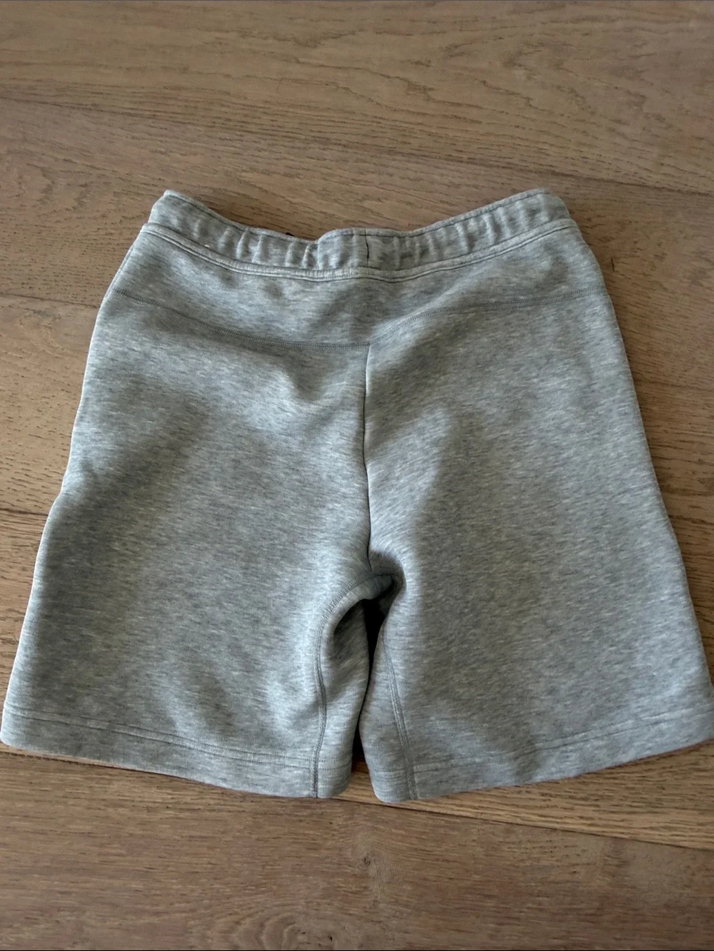 Nike Light Gray Kids Athletic Shorts with Black Accents